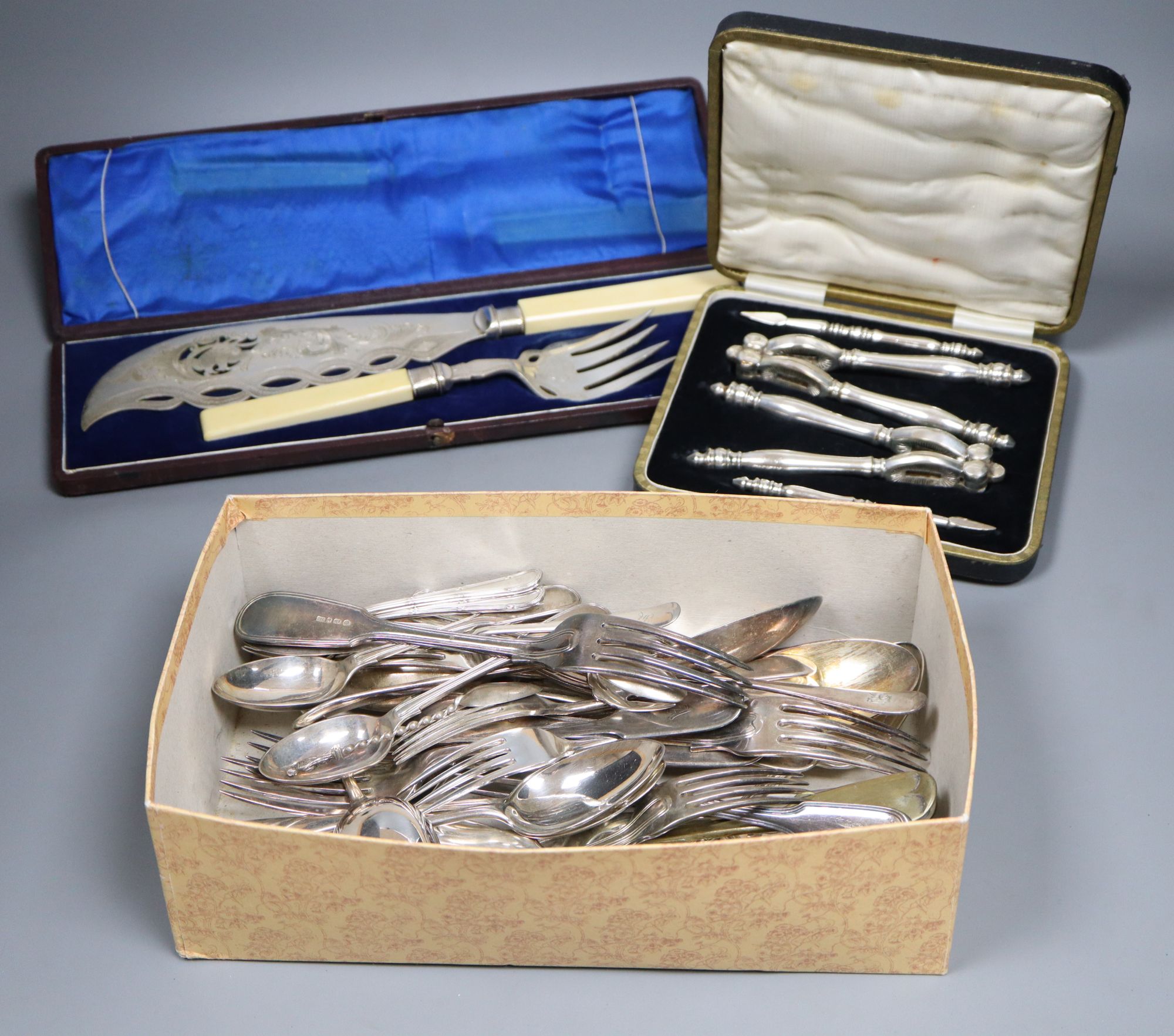 A pair of plated engraved bone handled fish servers, cased and a set of nut crackers, cased and assorted plated flatware.